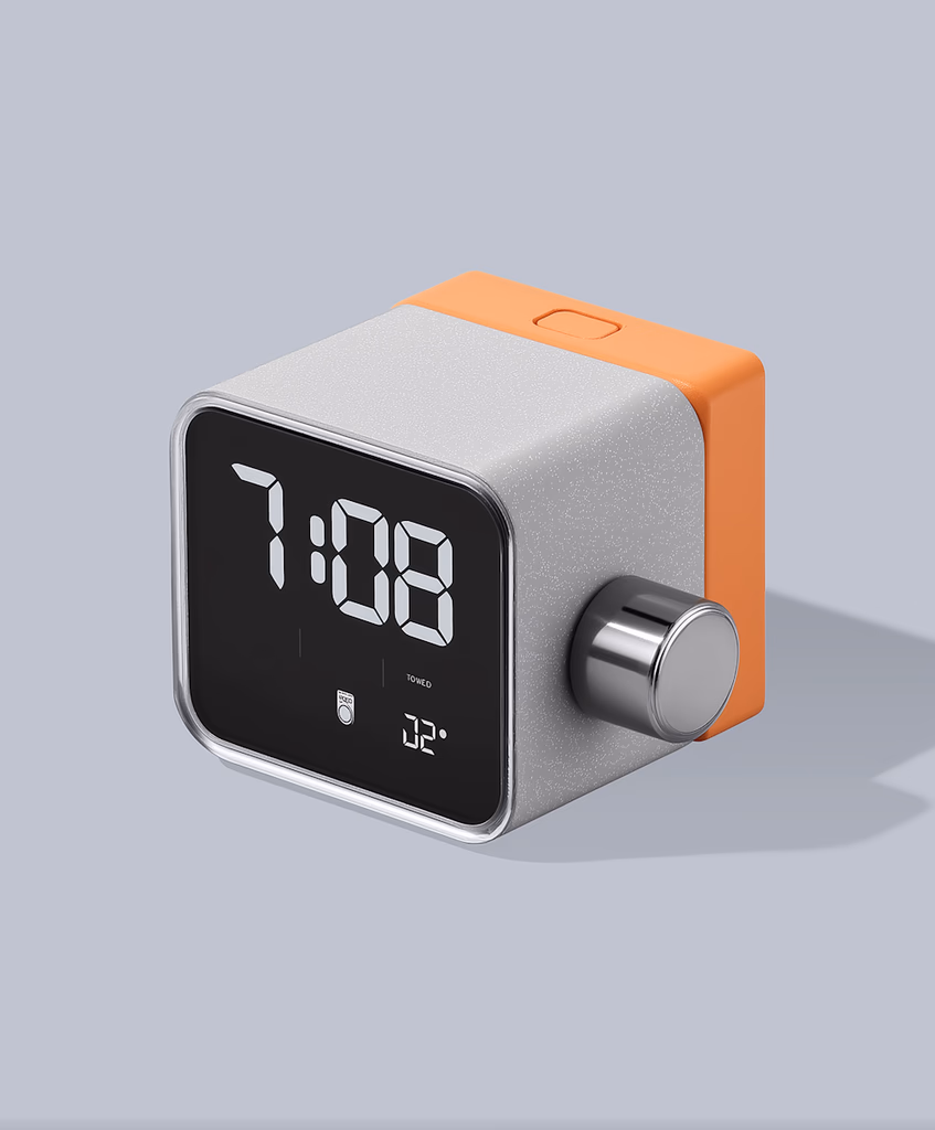 Reloj despertador digital sobre fondo claro